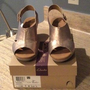Clarks pewter metallic shoes.